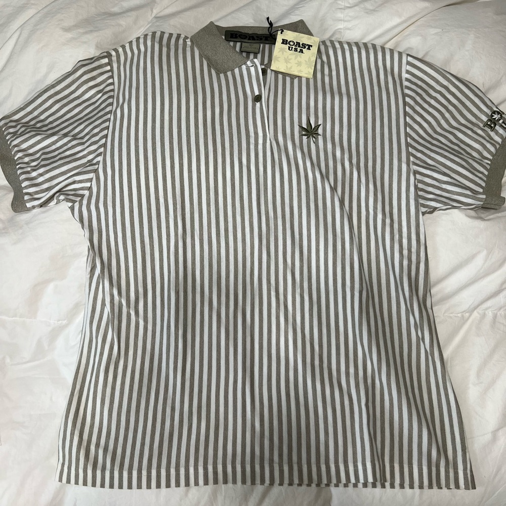 Sage green and white short sleeve men’s polo.